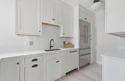 Kennebunk House | Luxury Designer Coastal Retreat | KBK | Heart of Lower Village—walk to shops, restaurants, and beaches, then unwind in your own private backyard oasis.