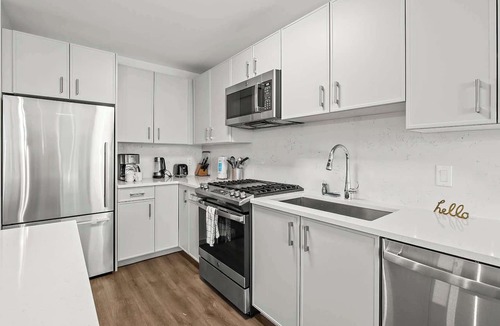 Downtown Apartment | Luxury High-Rise, Pool & Walk to Train