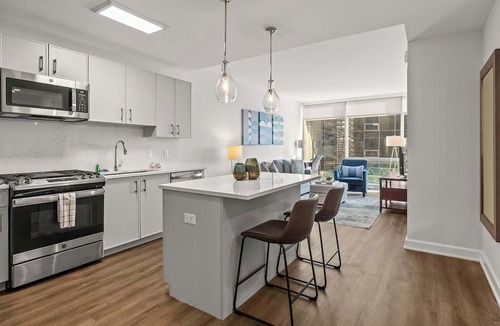 Downtown Apartment | Luxury High-Rise, Pool & Walk to Train