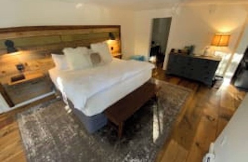 West Dover Resort | Luxury King Suite, Living Room w/sofa bed, balcony, & 1.5 baths
