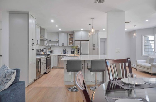 Manorville House | Manorville 4BR Home | Fenced Yard, Deck, Fireplace, Near East End Beaches