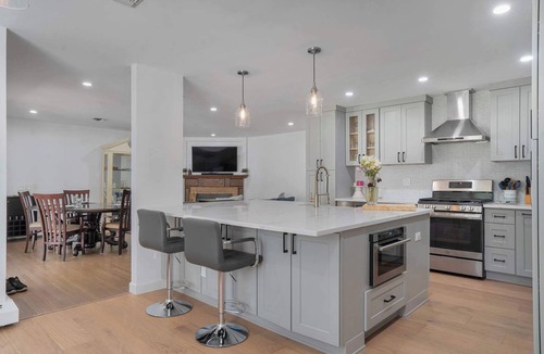 Manorville House | Manorville 4BR Home | Fenced Yard, Deck, Fireplace, Near East End Beaches