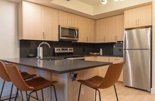 Waterloo Apartment | Modern 2-Bedroom Retreat Near Universities | Gym, Sauna & Theater