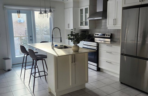 Saint-Hubert Condo | Modern 2BR Furnished Home near DIX30 & Downtown Montreal— Monthly Stays Welcome