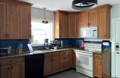 Harbor View - Orient Heights Apartment | Modern city & water view 1-bedroom apartment with AC. 4 blocks from T/beach