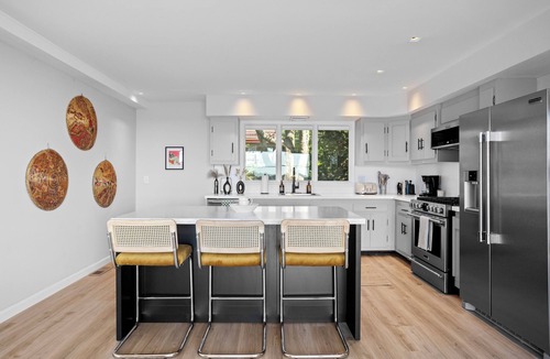 Guilford House | Modern Waterfront Oasis with Private Beach and Sunset Views