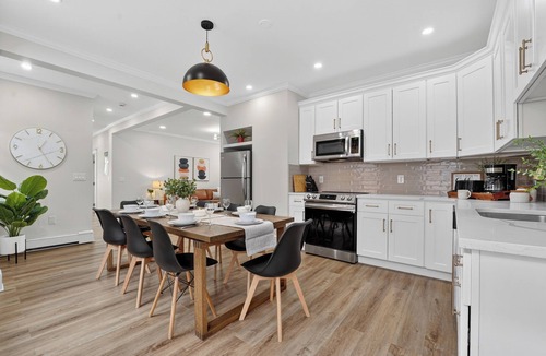 Codman Square House | Modern World Cup 5BR Near Downtown Parking, Backyard & Walk to Train