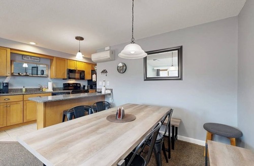 Jackson Condo | Mountain stunner with pools, hot tub, tennis, grilling area, & game tables