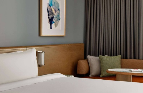 Lower Allston Hotel | Near Harvard Stadium | Dining. Gym + On-Site Bar