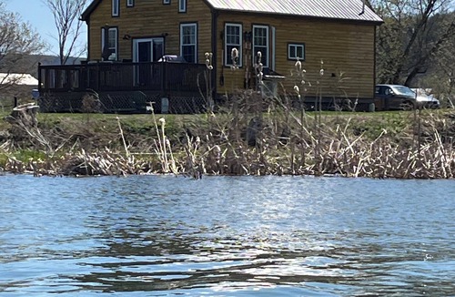Whitehall Cabin | Nestled along the Mettowee River this charming 2-bedroom cabin in Whitehall