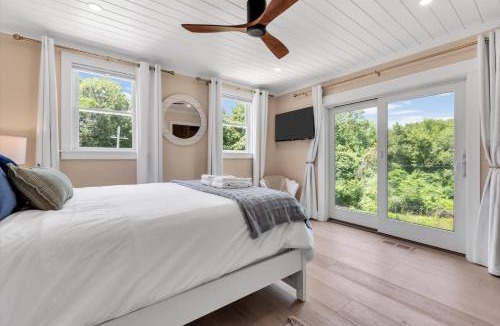 Silver Beach House | New Woodland Escape Walk To Beach and Bike Path 6 Sleeping Areas Kids Play Room Bird Watching Tower Garage Spacious Living Children's Amenities Covered 3rd Floor Patio Enjoy Wildlife