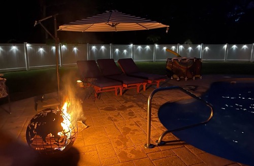 East Falmouth House | Nicely Furnished 3BD-Central Air, Awesome Backyard with Heated Pool & Fire Pit, Dog-Friendly