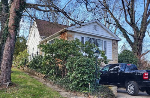 Novelty House | Novelty, Ohio retreat: 3 bedroom, 2 bath home - woods, King bed, wrap-around deck