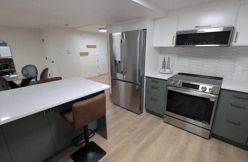 Ottawa Division Apartment | Nuevo Premium Monthly Rentals - Mid-Term - Garage Parking and EV charging