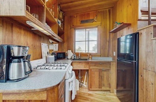 East Boothbay Cabin | Ocean Point Colony II- Waterfront Paradise with Dock, Sundeck & Epic Bay Views | Dog-Friendly