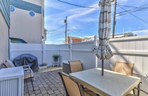 Ship Bottom Condo | Ocean side, 2 Floor Condo, 3rd from the Beach with a fenced in Patio!