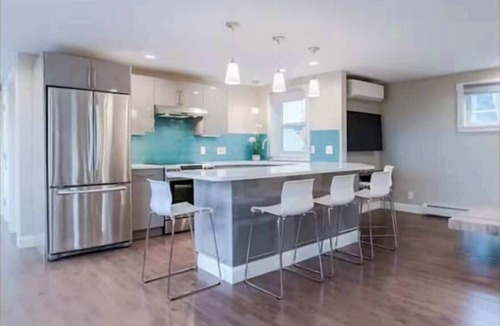Munjoy Hill Condo | Ocean Views/2BR King Beds/Pet-Friendly