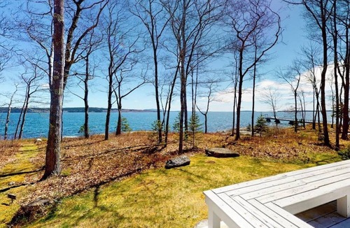 Brooklin House | Oceanfront retreat with sunrise views, screened porch, & deck