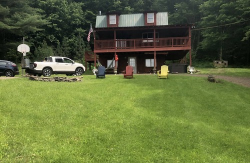 Walton House | Peaceful Cabin with Hot Tub, Game Room & Pond View