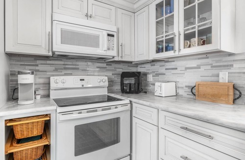 Mews Village Condo | Pool Villas- 2 bedrooms, 2 baths, sleeps 4, heated pool, gas fireplace, grill