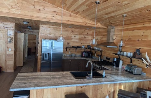 Lincoln House | Private 3-bedroom waterfront house with dock kayaks and paddle boards.