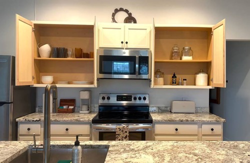 Lockport Apartment | Private Cinematic Loft, Café Downstairs, Quiet Workspace with 1.5 Bath