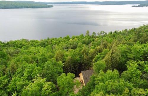 Madawaska Valley Ski Chalet | Private Cliffside Chalet Nestled in Nature With Western Sunsets & Waterfront Access Near Algonquin Park- Pass Included