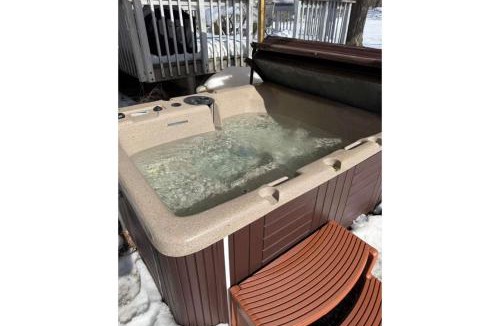 South Russell Apartment | Quiet Guest Space with Hot Tub, Laundry, and Gym