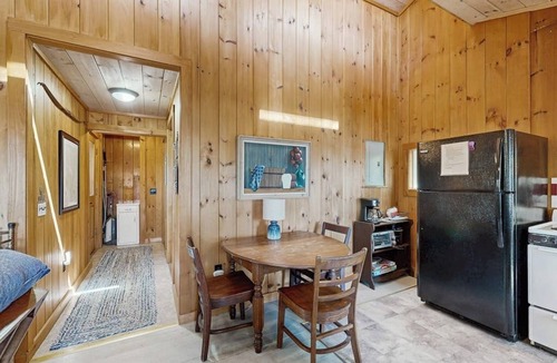 Ellsworth Cabin | Quiet lakefront cottage with a firepit, private beach, & two kayaks