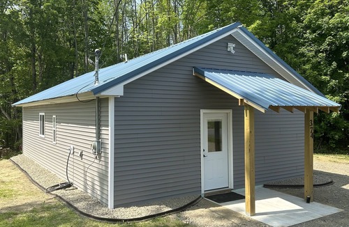 Dexter Cabin | Rail Trail Retreat! Recently remodeled cozy home on Snowmobile/ATV Trail!