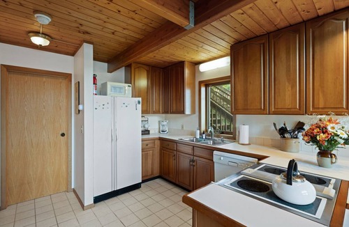 Romulus House | Relax at Poplar Beach Retreat on the sparkling waters of Cayuga Lake. This charming waterfront escape combines rustic character with bright, comfortable living spaces, creating the perfect setting for a relaxing Finger Lakes getaway.