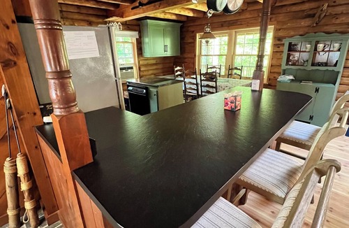East Harwich House | Relax in a tranquil log home on direct lake front property. The Hermitage awaits
