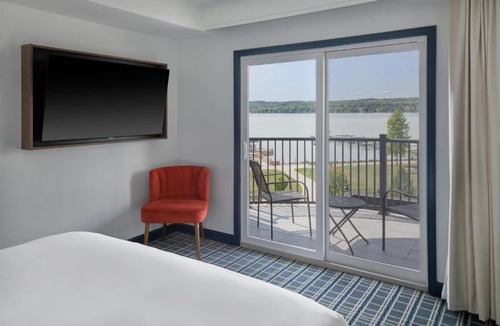 Canandaigua Hotel | Relax in Spacious Balcony Room Close to Adventure Spots + Pool & Hot Tub Access