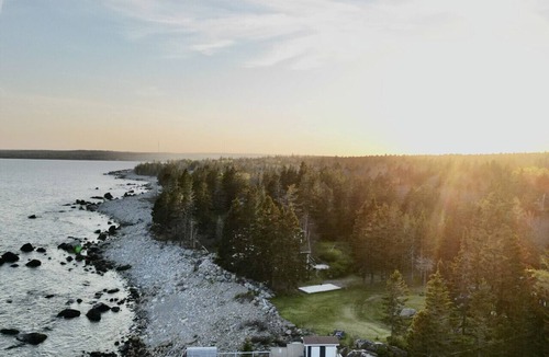 Hunts Point Cottage | Relaxing Oceanfront Retreat . Hot tub -sauna-pool-clear domes-private