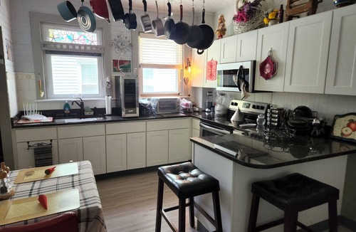 Off Broadway Apartment | Renovated, sun filled ground floor apartment
