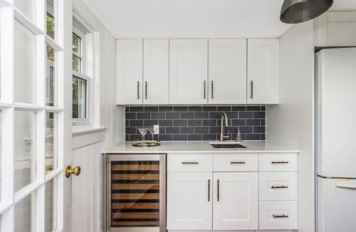 Bellport House | Resort-Style Bellport Estate: Private Heated Pool, Spa & Game Room