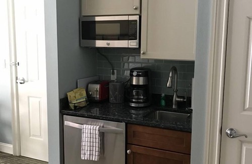 Lincoln Apartment | River Walk Resort at Loon studio, kitchenette, balcony, mount, river view, 5 fl
