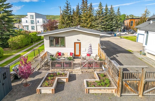 Northwest Calgary House | Riverfront Oasis on Calgary’s Best Street, AC, 5BR