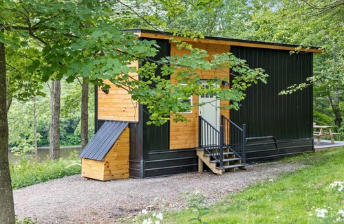 Johnson House | Riverside Tiny House with hot tub near Stowe