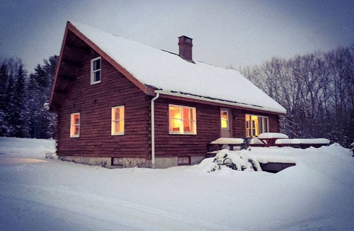 Exeter Cabin | Rustic Camping Cabin with Fireplace in Private Woods near Bangor, Maine