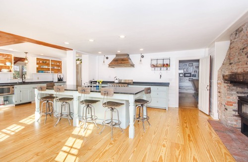Ipswich House | Rustic Luxe FarmHouse a Few Miles To Crane Beach: deck &jacuzzi overlooking pond