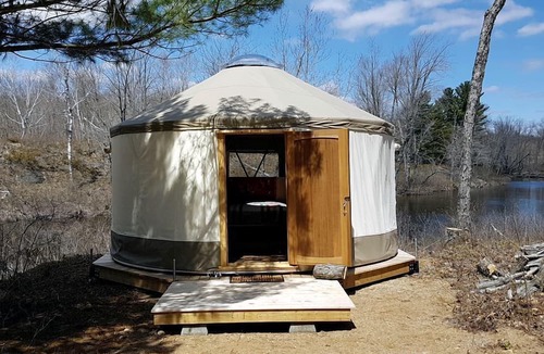 Stone Mills RV Rental | Rustic Waterfront Yurt on the Salmon River for a Peaceful Glamping Escape near Tamworth, Ontario