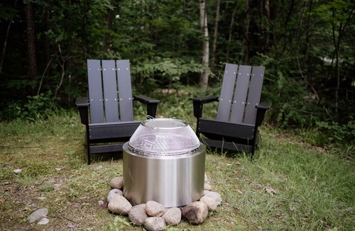 Woodstock RV Rental | Safari Tent Site 9 | 1 Queen Bed & 1 Bunk Bed | Pond View