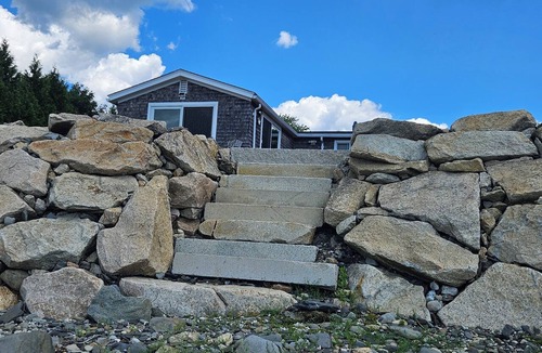 Tiverton House | Sapowet Cove direct beach access sitting on deck watching spectacular sunset.