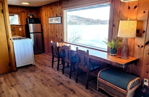 Laconia Cabin | Scenic Lakeside Cabin with Exclusive Boat Dock Near Weirs Beach, Laconia, New Hampshire