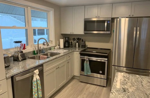 Standish House | Sebago Lake, ME Lakeside Hot Tub just renovated