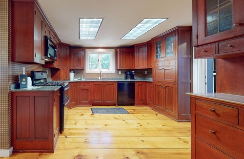 Mirror Lake House | Secluded, dog-friendly home with screened porch, firepit, fireplace & W/D