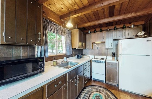 Parsonsfield House | Secluded waterfront cabin with private dock, kayak, canoe, gas grill & deck