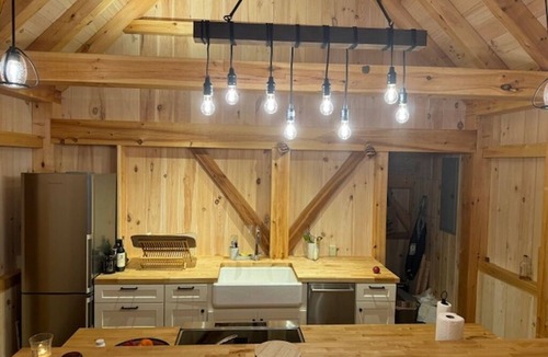 Barndoor Island Cottage | Serene 2-bedroom cottage with detached bunk house for relaxing stays.