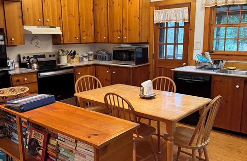 West Tisbury House | serene wooded 3-bedroom house West Tisbury deck, screen porch and outdoor shower